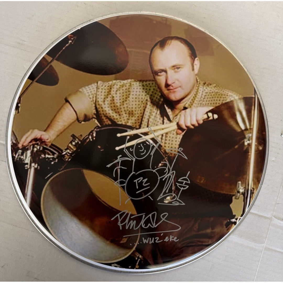 Phil Collins One of a Kind drum head signed with sketch and proof.
