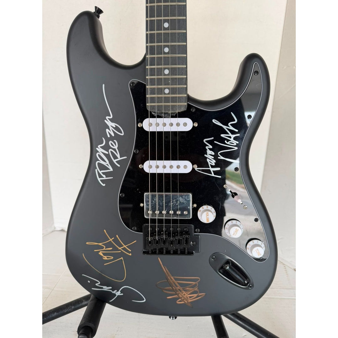 Nine Inch Nails, Jeordie White, Josh Freese, Trent Reznor, Alessandro Cortini, Aaron North stratocaster electric guitar signed with proof.
