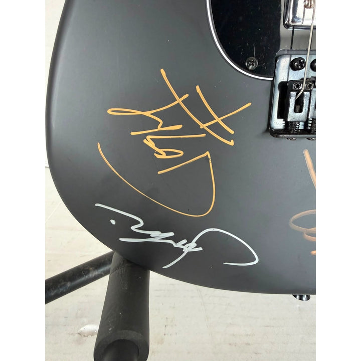 Nine Inch Nails, Jeordie White, Josh Freese, Trent Reznor, Alessandro Cortini, Aaron North stratocaster electric guitar signed with proof.