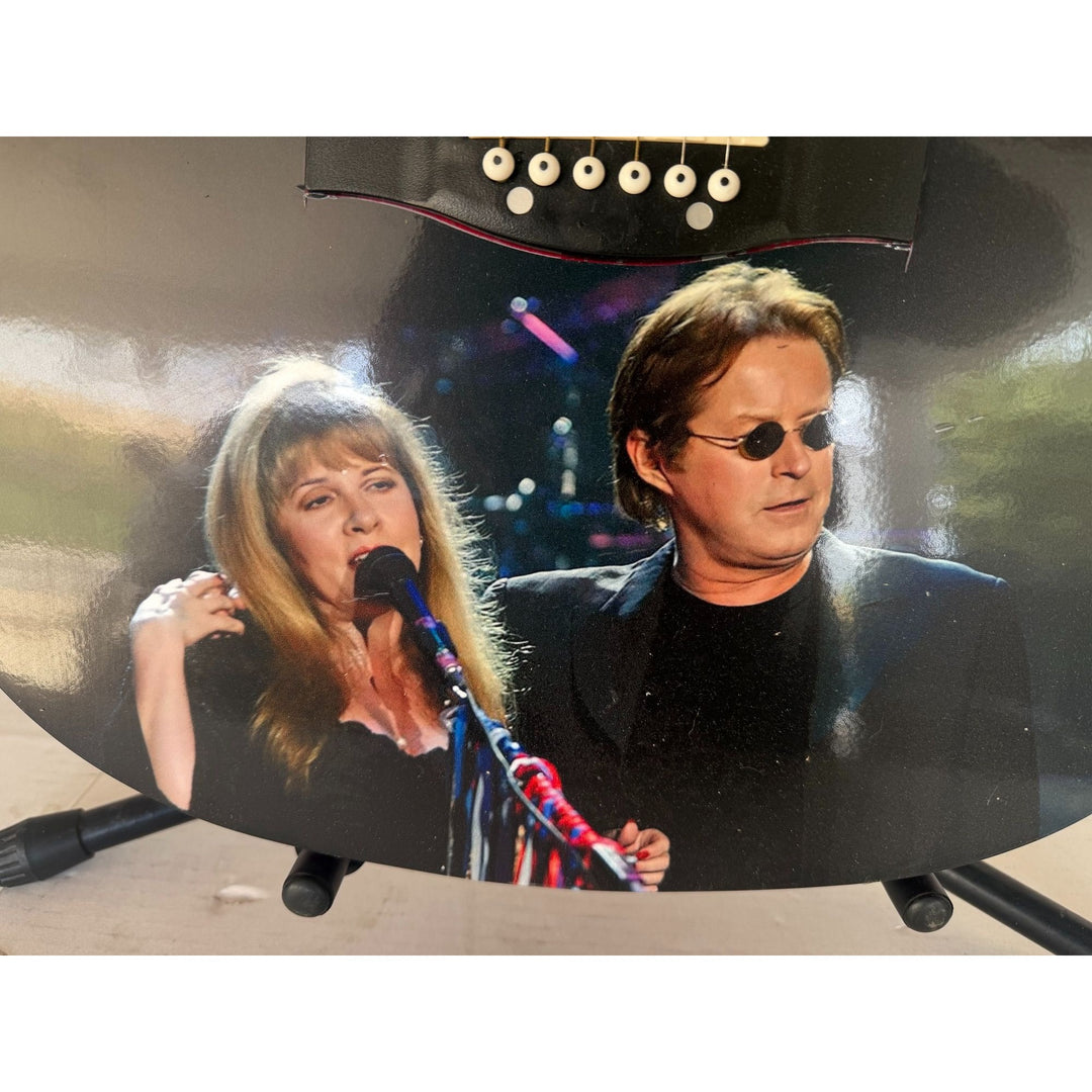 Stevie Nicks and Don Henley one of a kind acoustic guitar signed with proof.