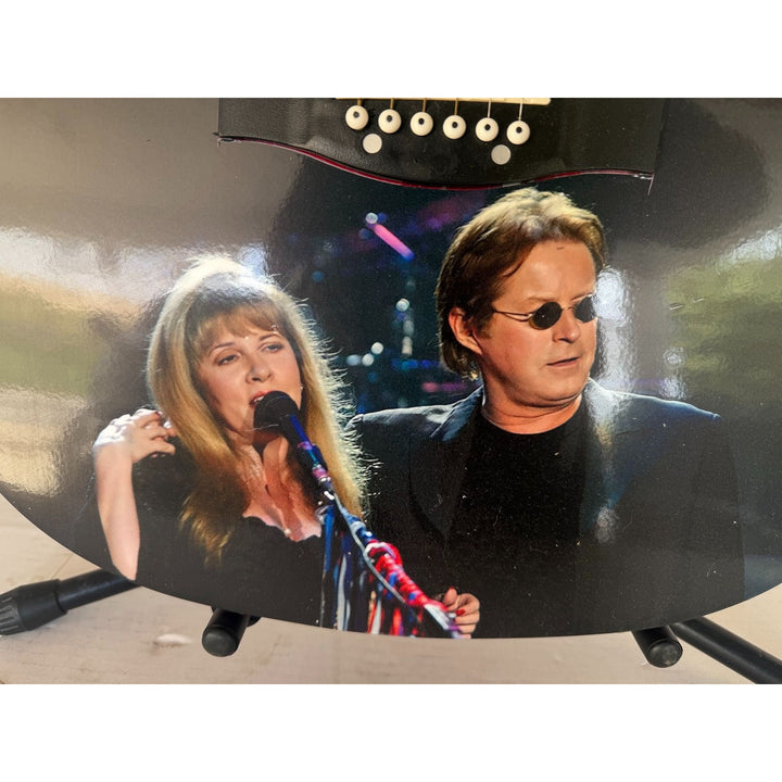 Stevie Nicks and Don Henley one of a kind acoustic guitar signed with proof.