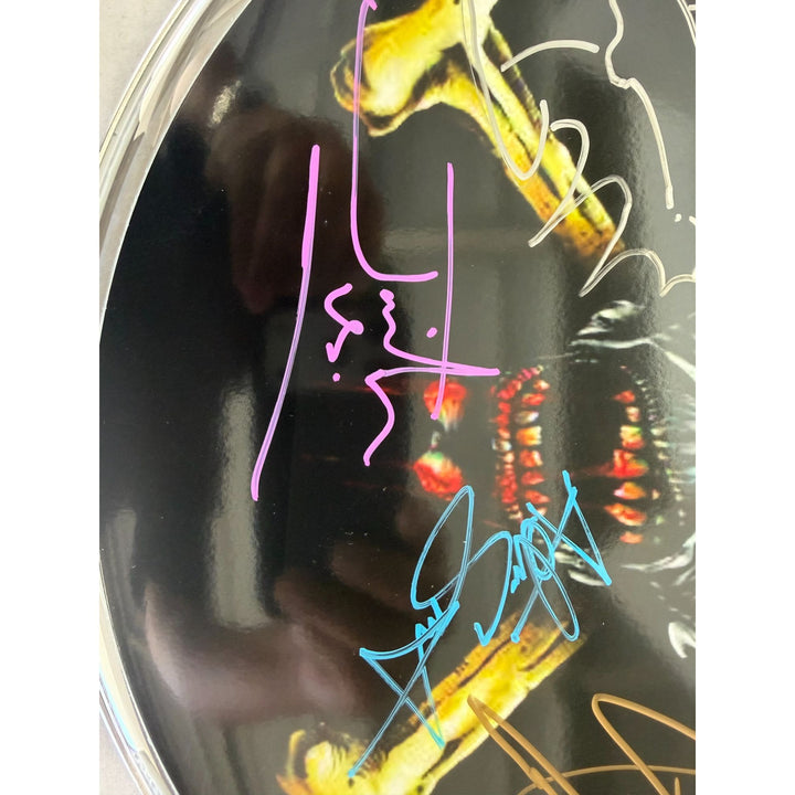 Iron Maiden one-of-a-kind drumhead signed with proof.