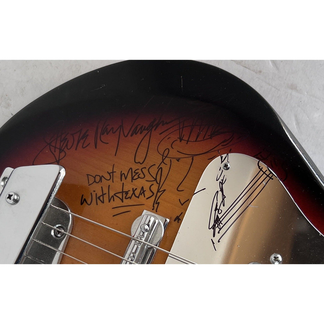 Stevie Ray Vaughan 1960s full size vintage electric guitar  signed with hand sketch & signing proof.