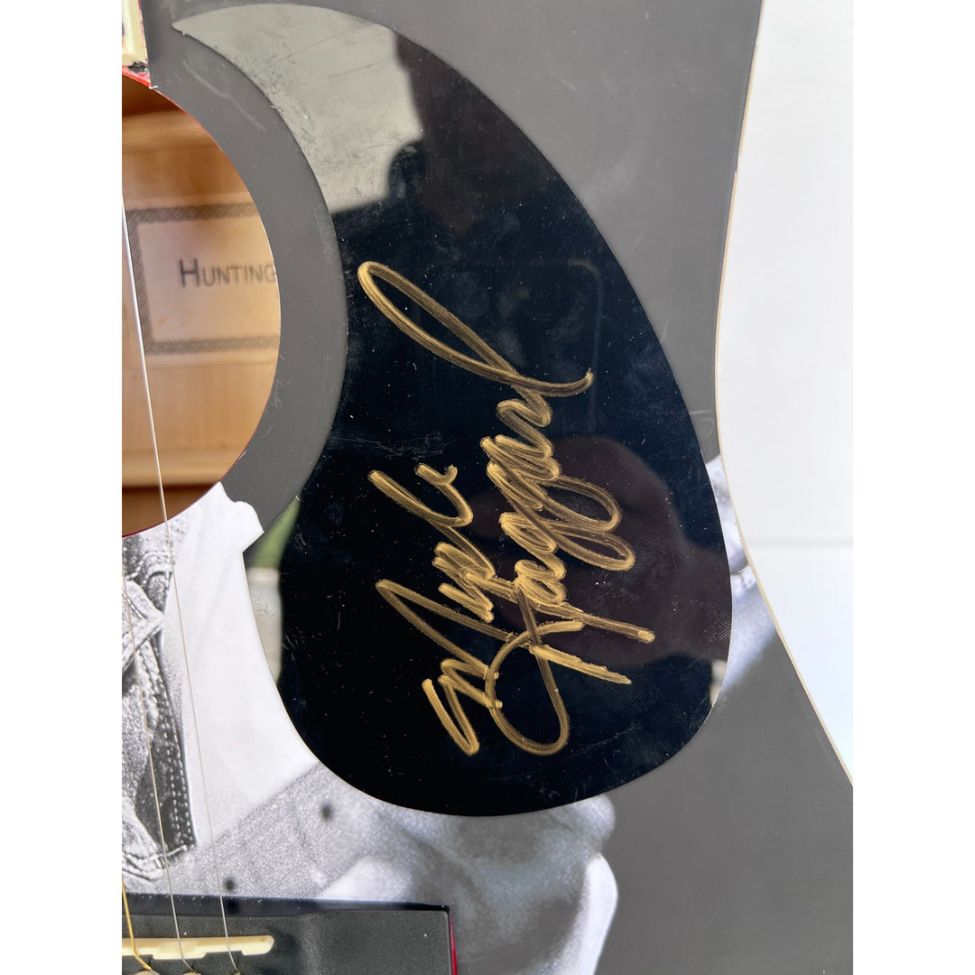 Merle Haggard   one of a kind full size acoustic guitar signed with poof.