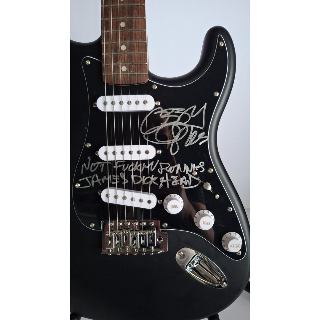Ozzy Osbourne, Black Sabbath signed with inscription for Ronnie James Dio, Fender Stratocaster electric guitar signed with proof