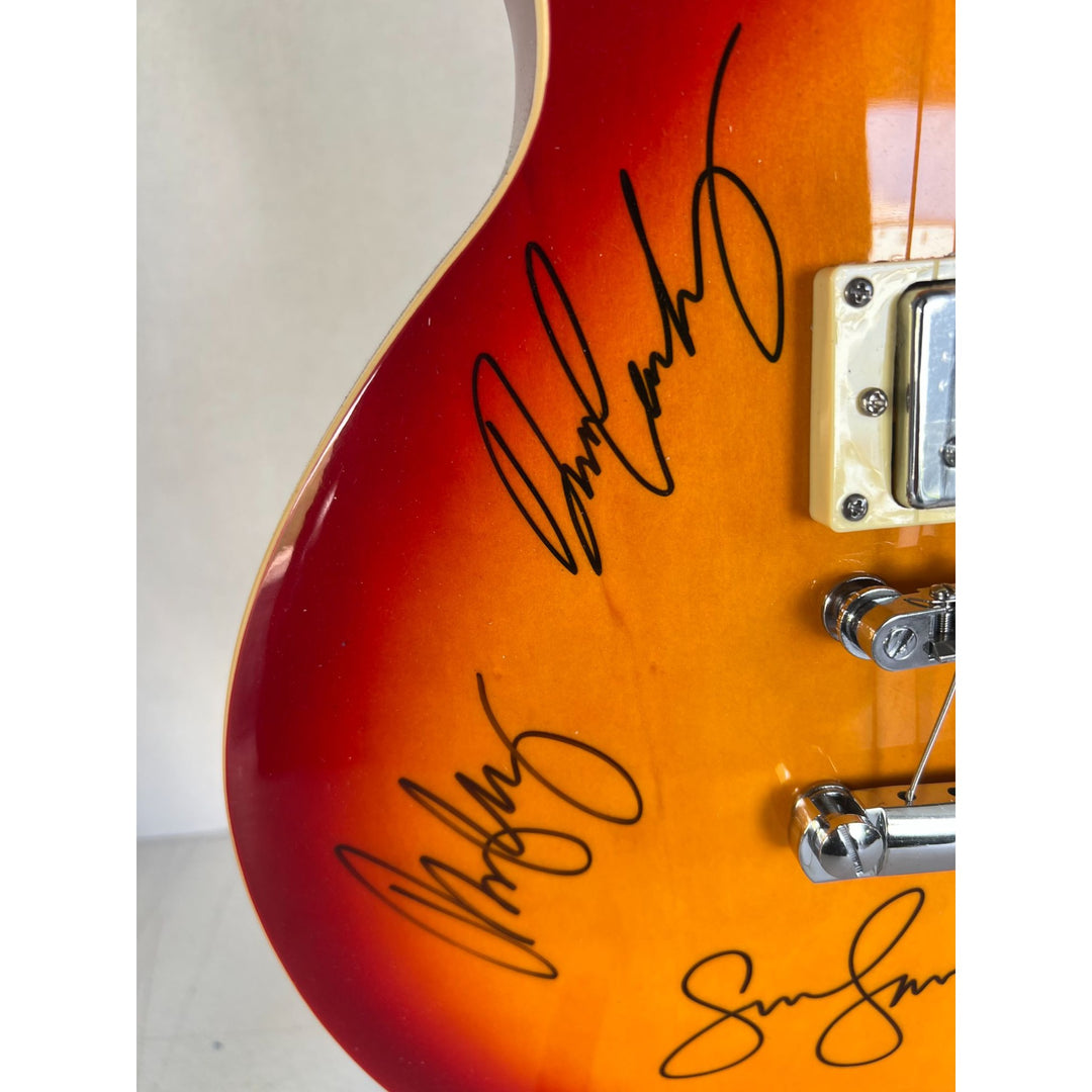 "CSNY" David Crosby, Neil Young, Graham Nash, Stephen Stills cherry vintage les paul signed with proof