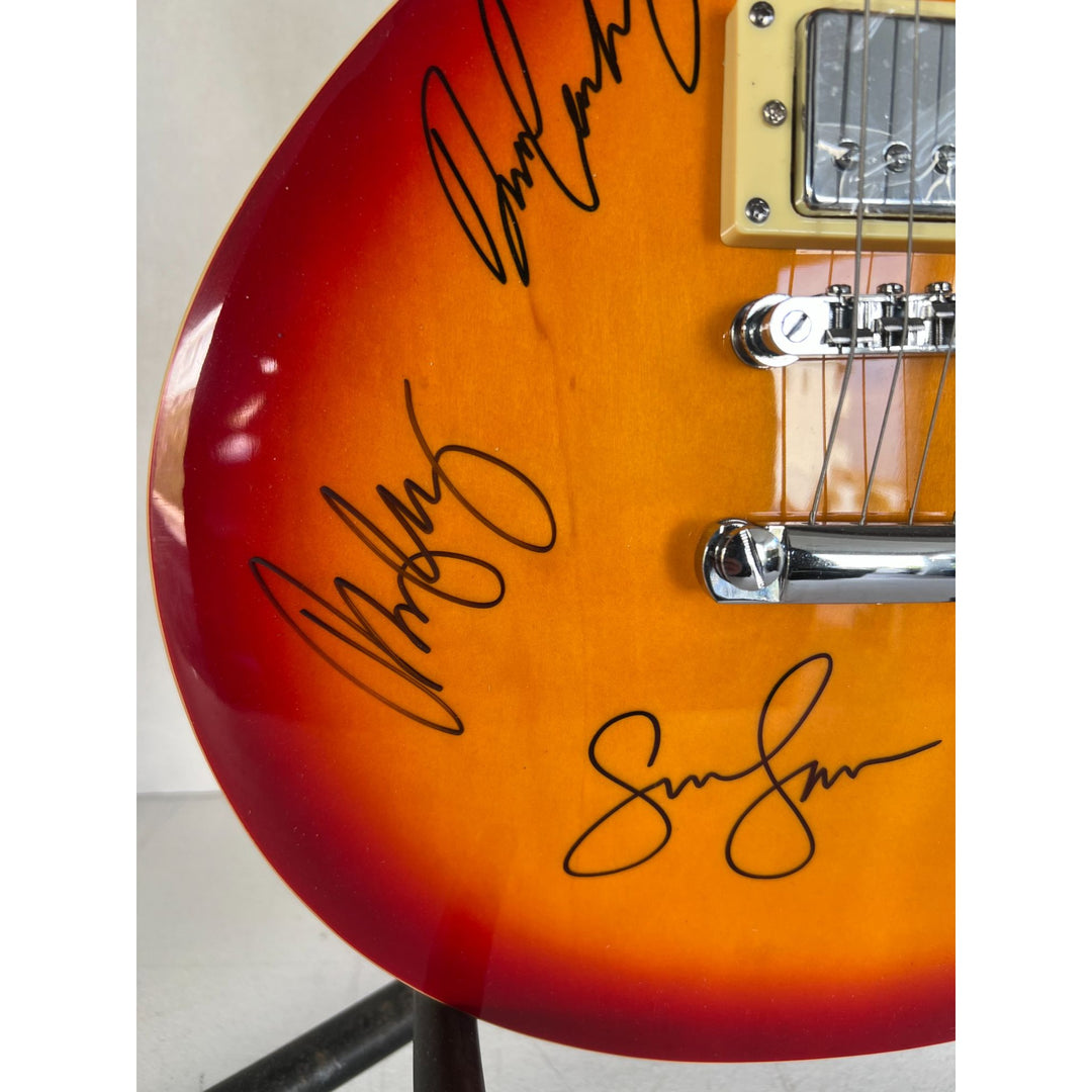 "CSNY" David Crosby, Neil Young, Graham Nash, Stephen Stills cherry vintage les paul signed with proof