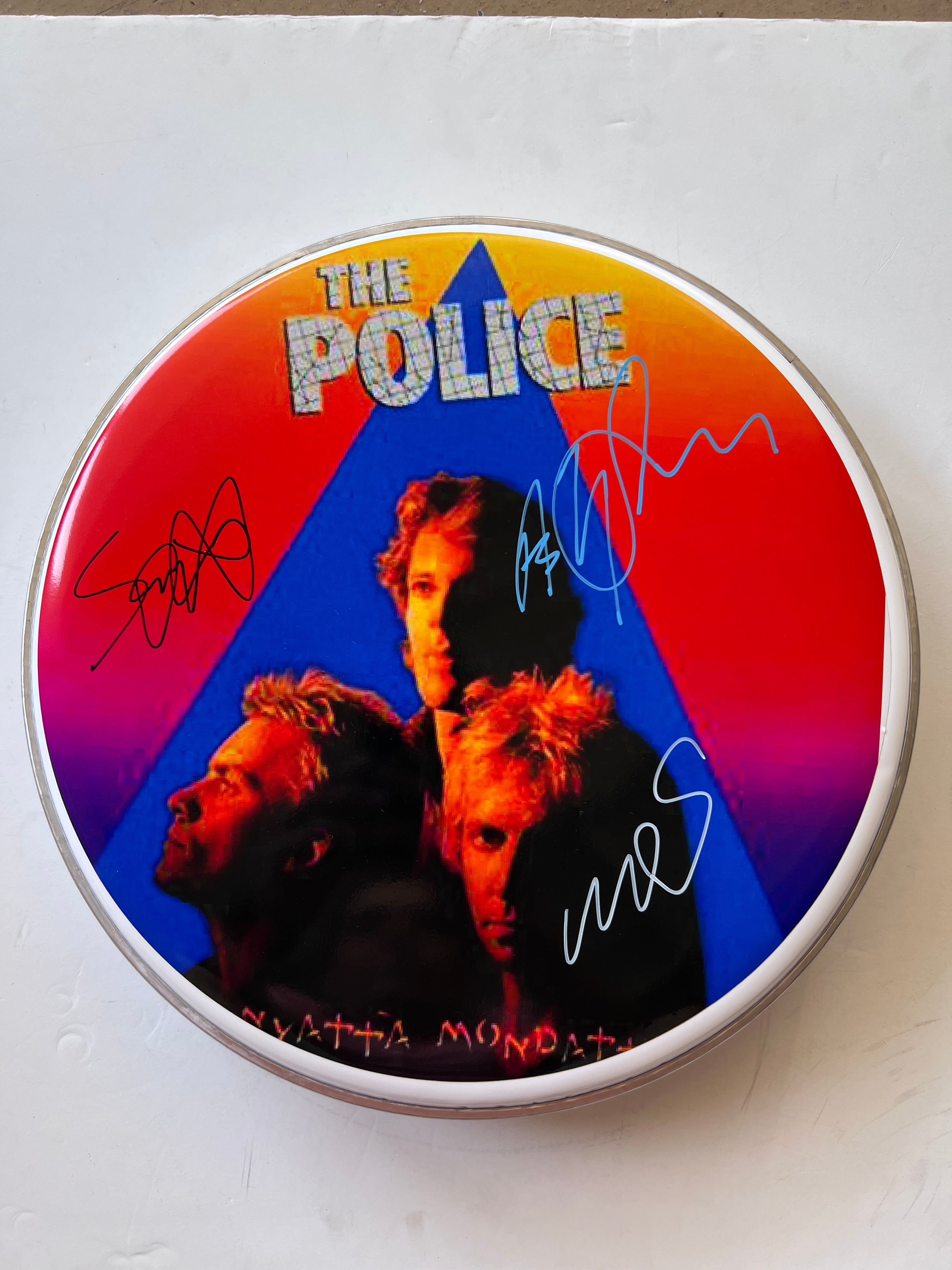 The Police Gordon Sumner "Sting", Stewart Copeland, Andy Summers one-of-a-kind drum head signed with proof
