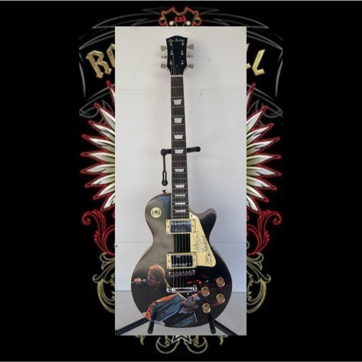 The Eagles Don Henley & Glenn Frey  one of a kind les paul (full size) electric guitar signed with proof.