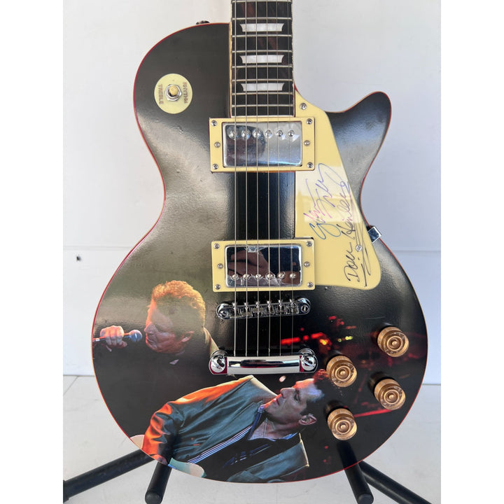 The Eagles Don Henley & Glenn Frey  one of a kind les paul (full size) electric guitar signed with proof.