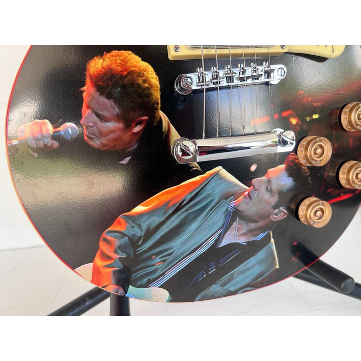 The Eagles Don Henley & Glenn Frey  one of a kind les paul (full size) electric guitar signed with proof.