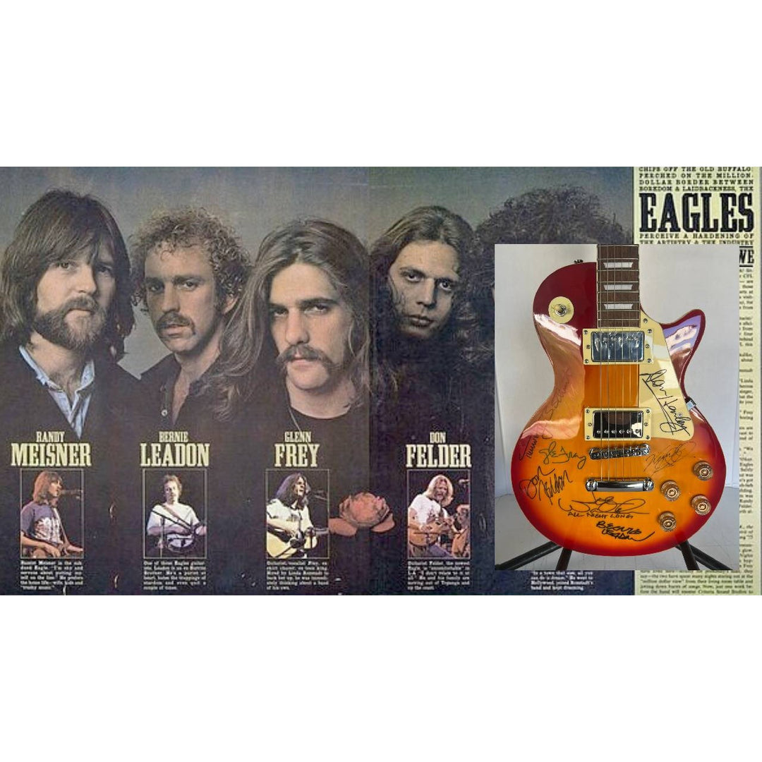 Bernie Leadon, Glenn Frey, Don Henley, Joe Walsh, Don Felder, Randy Meisner Timothy B. Schmit The Eagles Cherry Les Paul guitar signed.