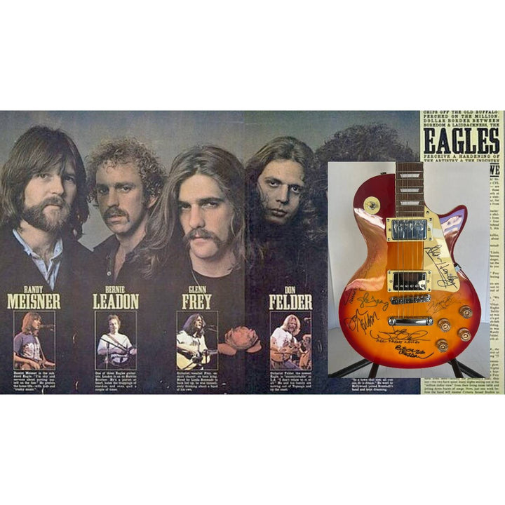 Bernie Leadon, Glenn Frey, Don Henley, Joe Walsh, Don Felder, Randy Meisner Timothy B. Schmit The Eagles Cherry Les Paul guitar signed.