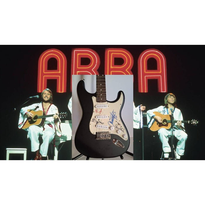 ABBA Anni-Frid Lyngstad Benny Anderson Bjorn Ulvaeus Agnetha Fältskog Zenni Fender Stratocaster electric guitar signed with proof