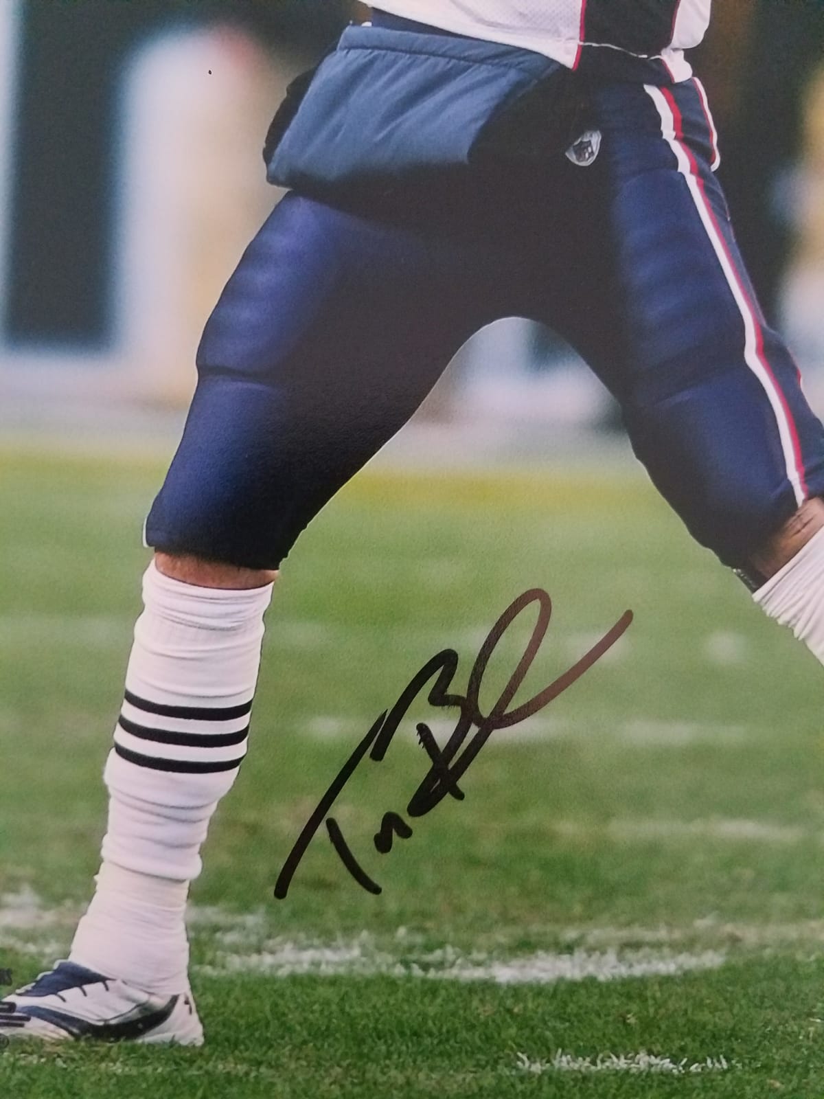 Tom Brady GOAT eight by 10 signed with proof