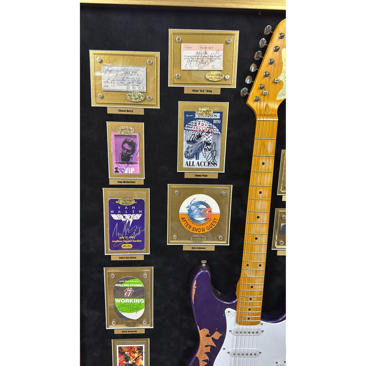 Jimi Hendrix, Stevie Ray Vaughan, George Harrison, 34 of Rock n Rolls greatest guitarists off all time with Jimi Hendrix guitar