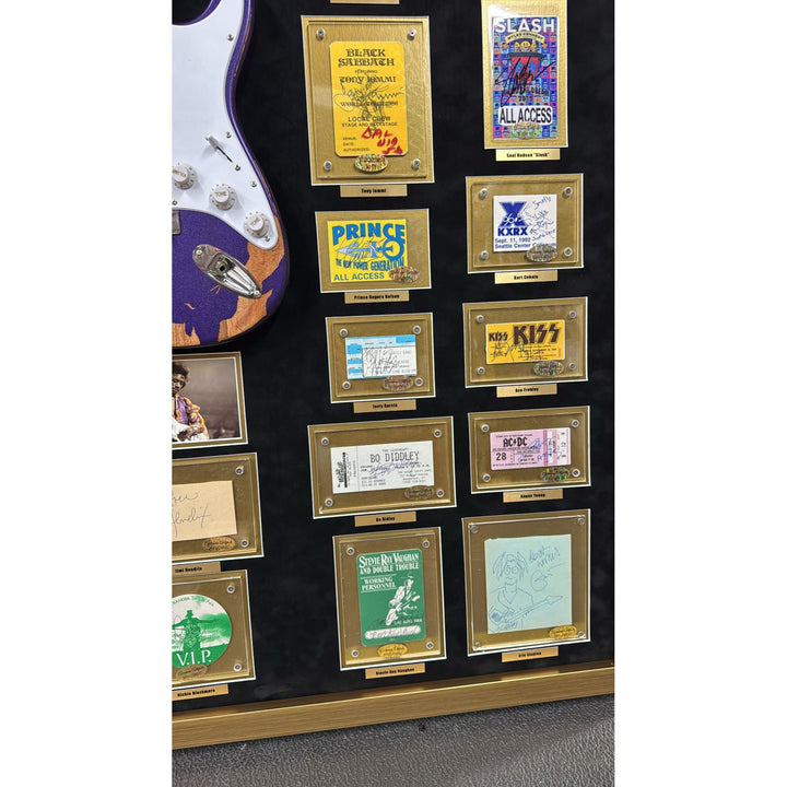 Jimi Hendrix, Stevie Ray Vaughan, George Harrison, 34 of Rock n Rolls greatest guitarists off all time with Jimi Hendrix guitar