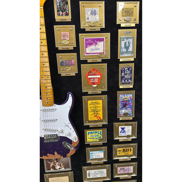 Jimi Hendrix, Stevie Ray Vaughan, George Harrison, 34 of Rock n Rolls greatest guitarists off all time with Jimi Hendrix guitar