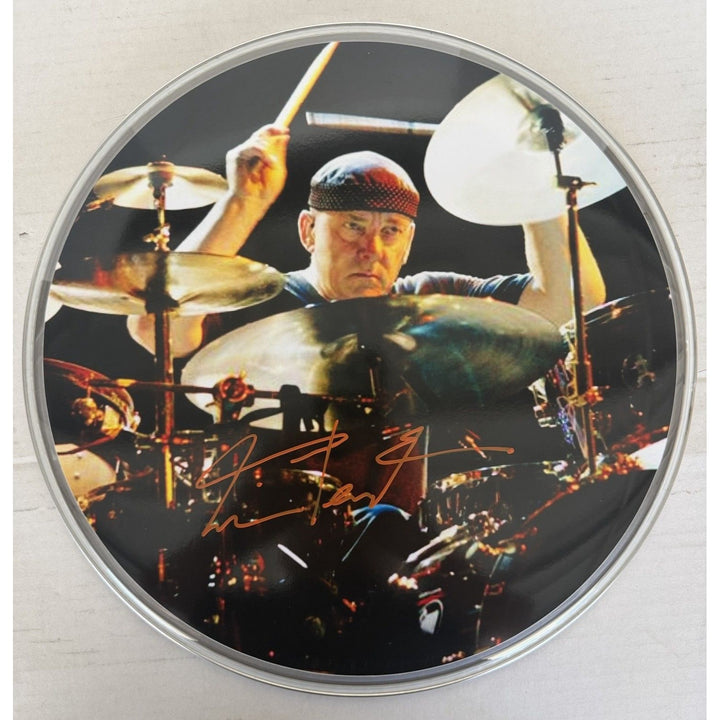 Neil Peart Rushs' iconic drummer one-of-a-kind drumhead signed with proof.