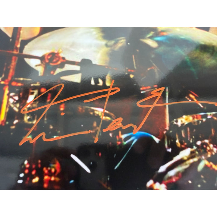 Neil Peart Rushs' iconic drummer one-of-a-kind drumhead signed with proof.