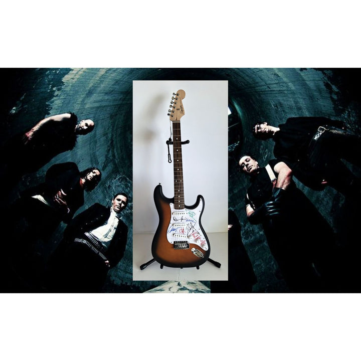 Rammstein: Richard Z. Kruspe, Till Lindemann, Oliver Riedel, Paul Landers, Christian Lorenz & Christoph Schneider Fender Stratocaster signed with proof