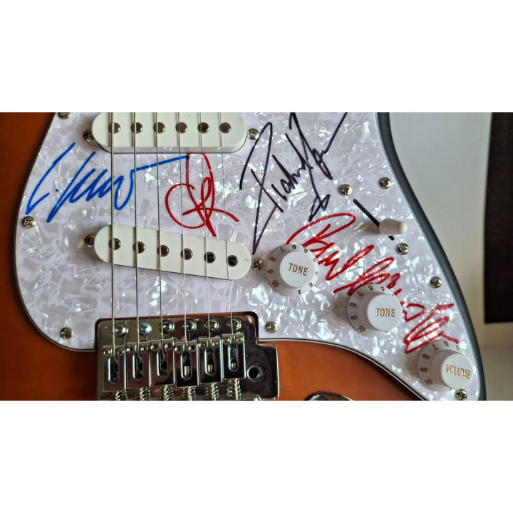 Rammstein: Richard Z. Kruspe, Till Lindemann, Oliver Riedel, Paul Landers, Christian Lorenz & Christoph Schneider Fender Stratocaster signed with proof