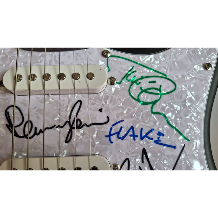 Rammstein: Richard Z. Kruspe, Till Lindemann, Oliver Riedel, Paul Landers, Christian Lorenz & Christoph Schneider Fender Stratocaster signed with proof