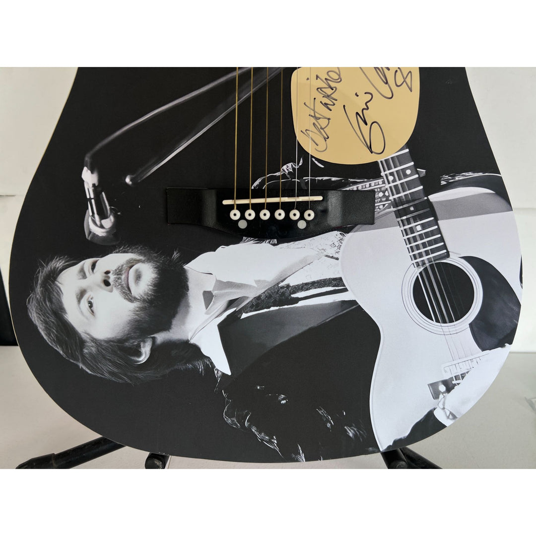 Eric Clapton  full size acoustic guitar (one of a kind ) signed with proof.