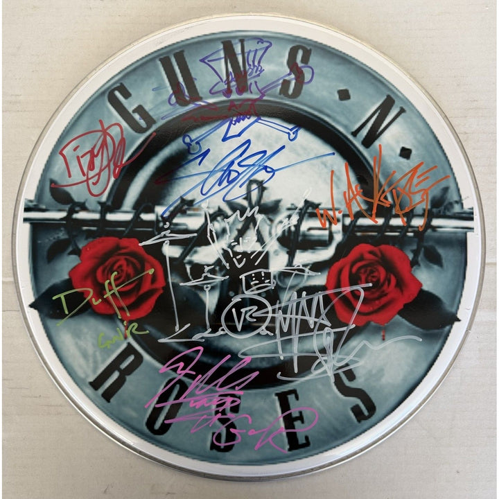 Axl Rose, Slash, Matt Sorum, Duff Mckagan, Steven Adler, Dizzy Reed, Guns N' Roses, one-of-a-kind, drumhead, signed with proof.