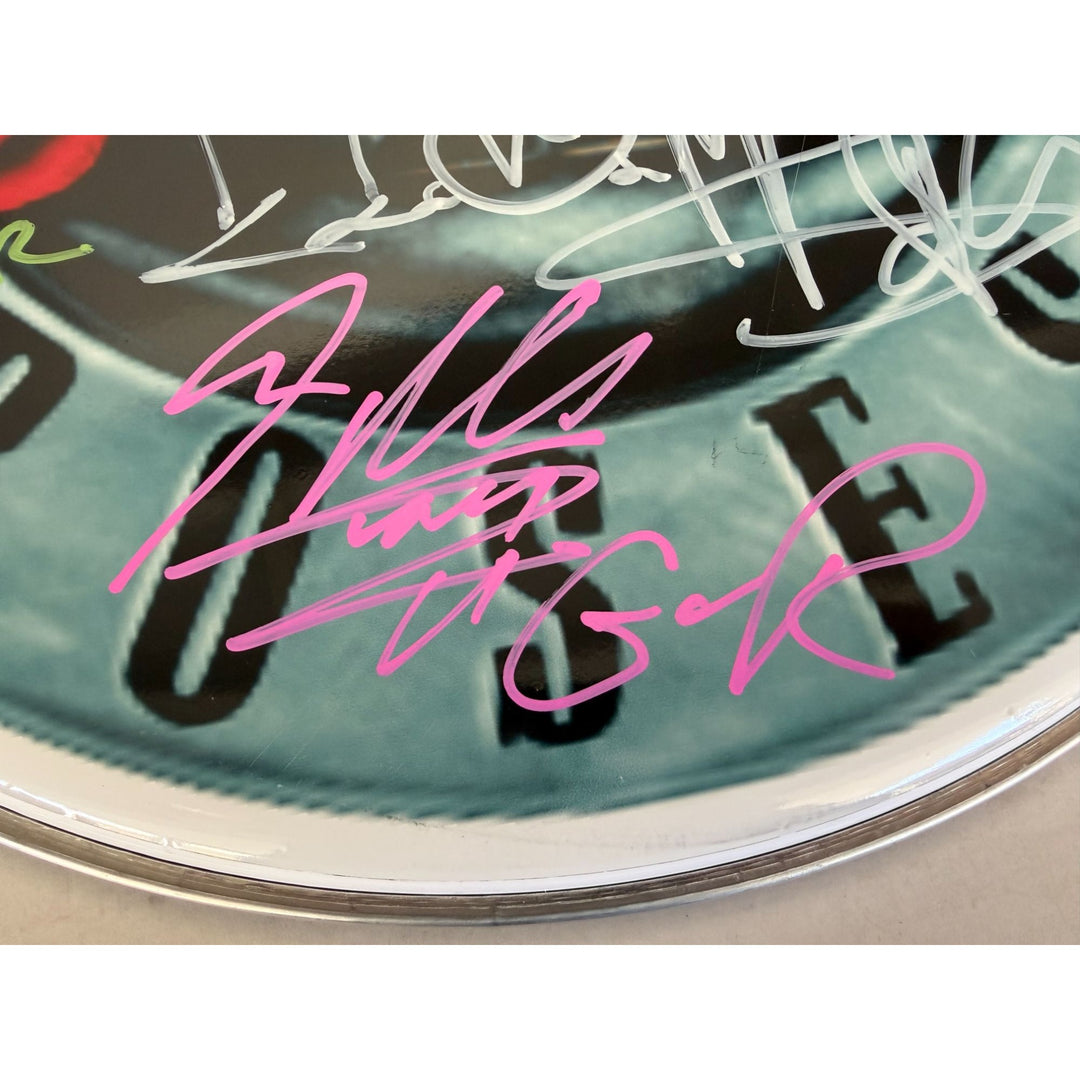 Axl Rose, Slash, Matt Sorum, Duff Mckagan, Steven Adler, Dizzy Reed, Guns N' Roses, one-of-a-kind, drumhead, signed with proof.