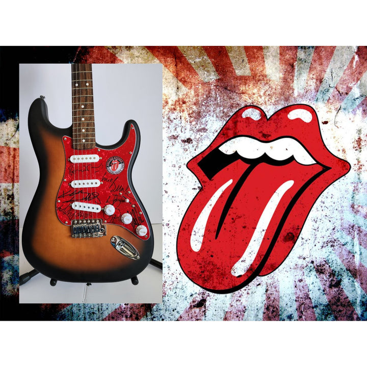 Mick Jagger, Keith Richards, Bill Wyman, Ronnie Wood, Mick Taylor, Charlie Watts Fender Stratocaster electric guitar signed with proof