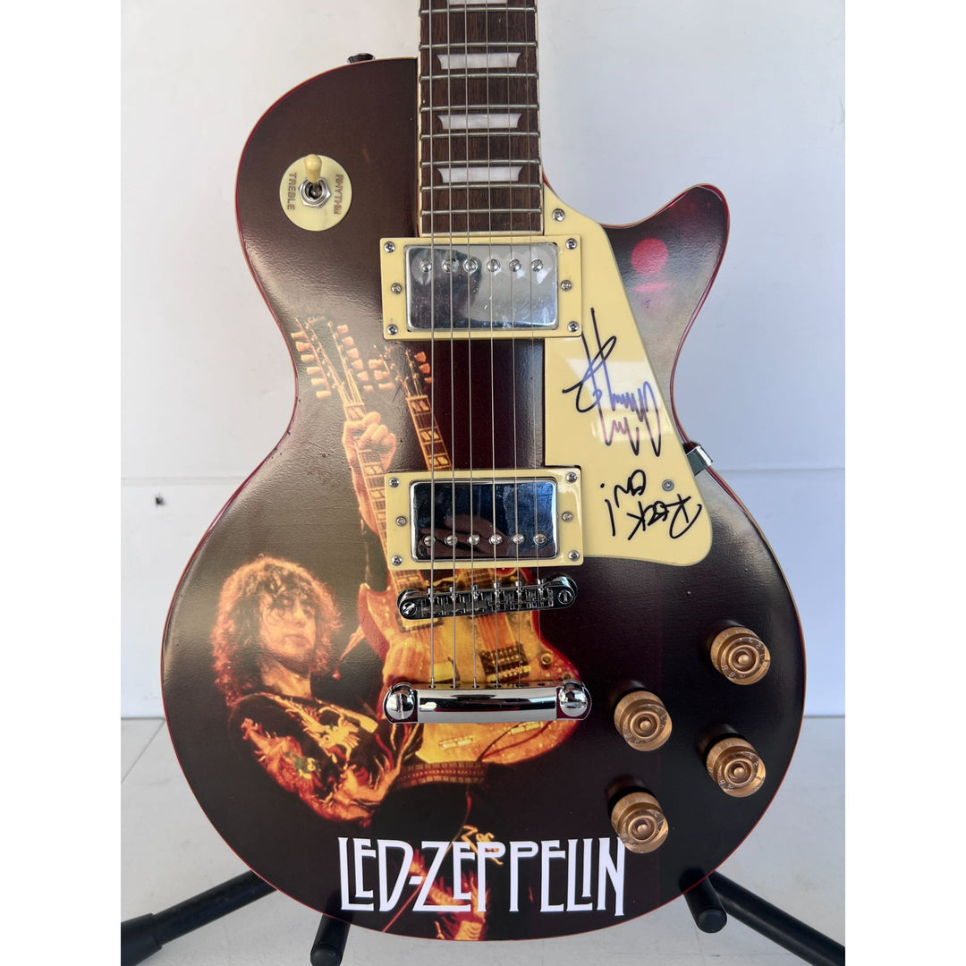 Led Zeppelin Jimmy Page  one of a kind les paul (full size) electric guitar signed with proof.