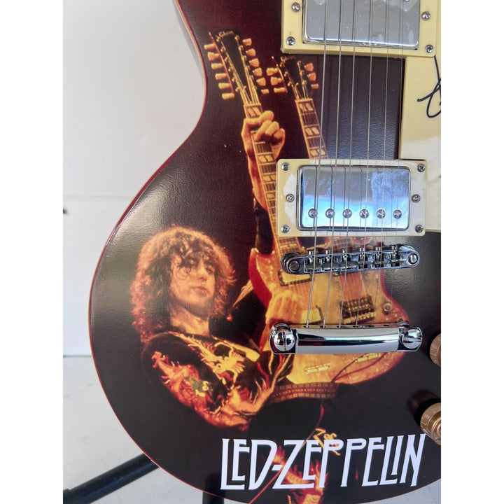 Led Zeppelin Jimmy Page  one of a kind les paul (full size) electric guitar signed with proof.