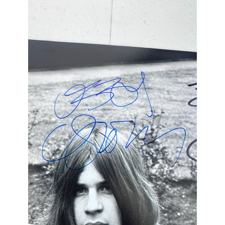 Ozzy Osbourne, Tony Iommi, Geezer Butler, Bill Ward Black Sabath vintage 11x14 photo signed with proof.