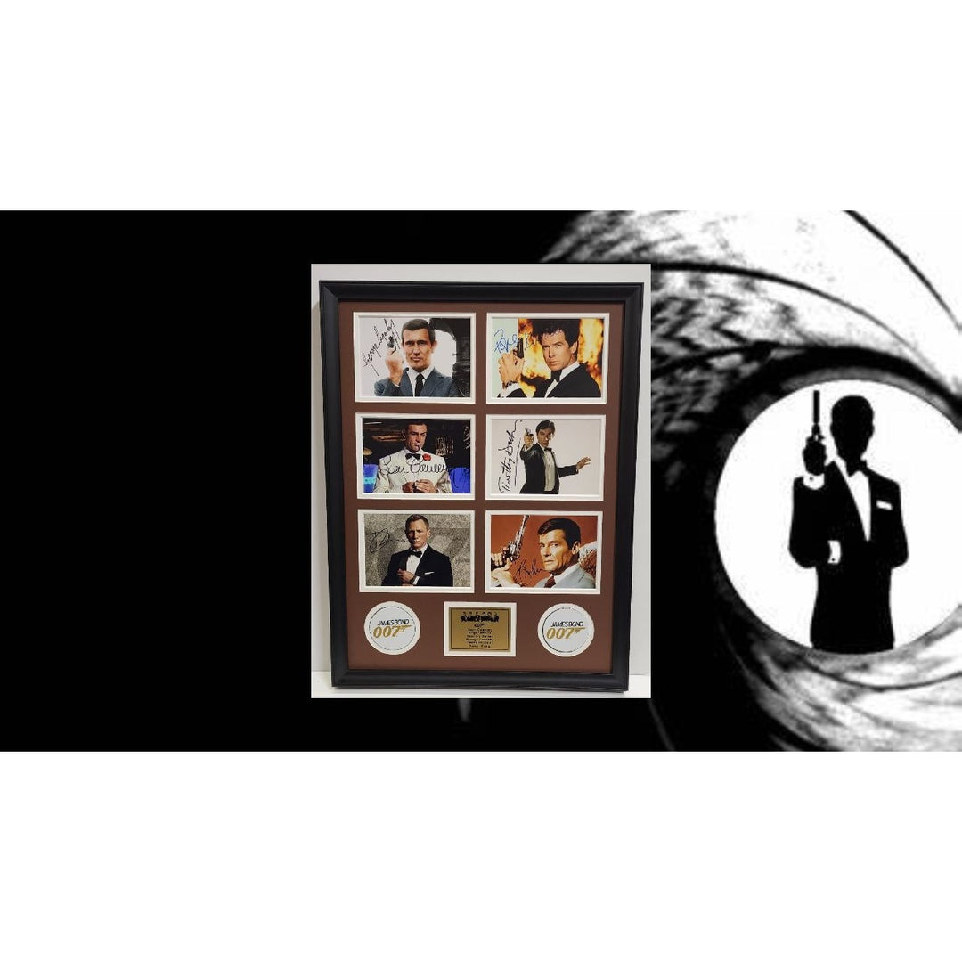 Roger Moore Pierce Brosnan Sean Connery James Bond 007 5x7 photos with Museum quality frame 22x28 signed with proof.
