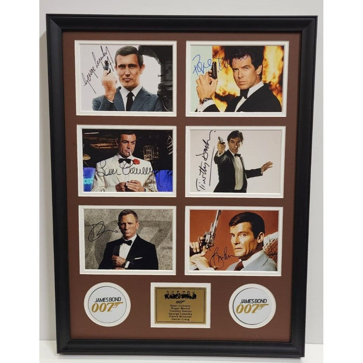 Roger Moore Pierce Brosnan Sean Connery James Bond 007 5x7 photos with Museum quality frame 22x28 signed with proof.