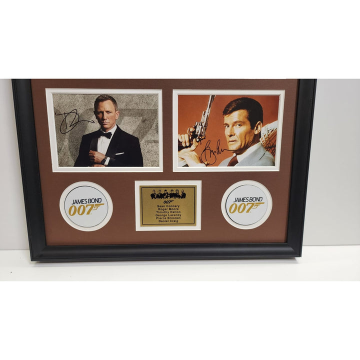Roger Moore Pierce Brosnan Sean Connery James Bond 007 5x7 photos with Museum quality frame 22x28 signed with proof.
