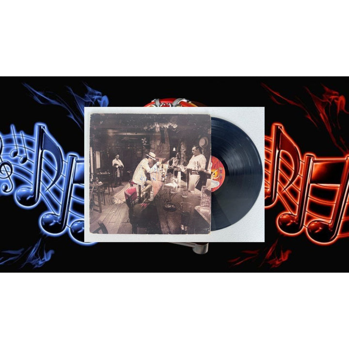 Led Zeppelin in Through the Outdoor 1979 Og Vinyl LP Jimmy Page, Robert Plant, John Paul Jones signed with proof.