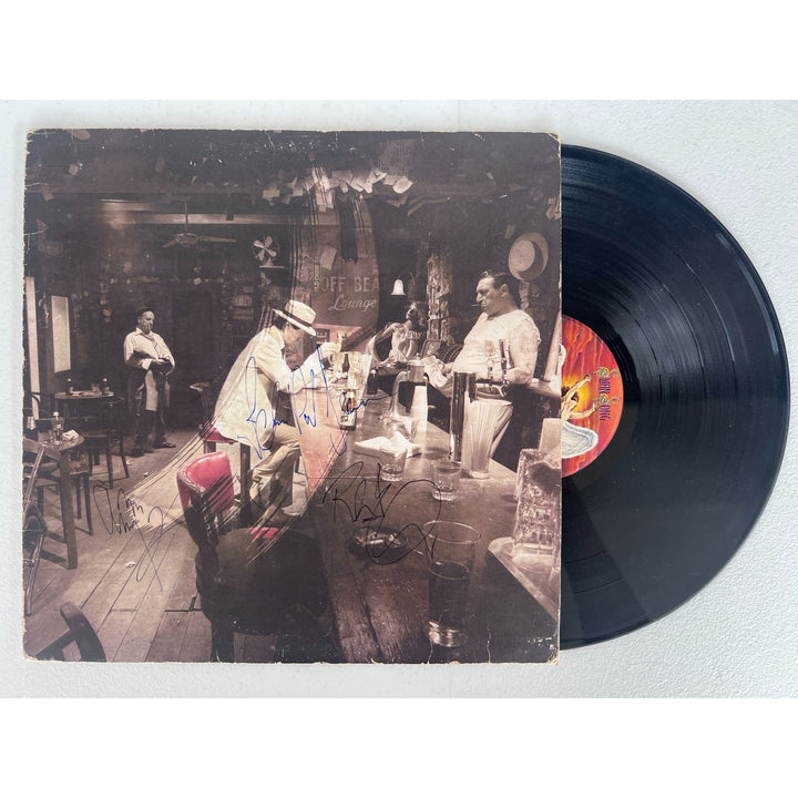 Led Zeppelin in Through the Outdoor 1979 Og Vinyl LP Jimmy Page, Robert Plant, John Paul Jones signed with proof.