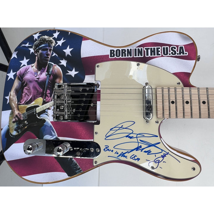 Bruce Springsteen signed with hand sketch one of a kind full size electric guitar signed with proof.