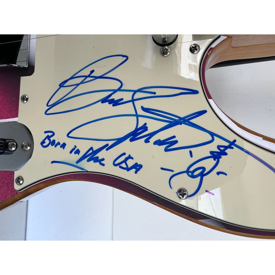 Bruce Springsteen signed with hand sketch one of a kind full size electric guitar signed with proof.