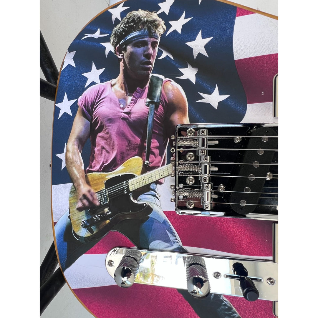 Bruce Springsteen signed with hand sketch one of a kind full size electric guitar signed with proof.