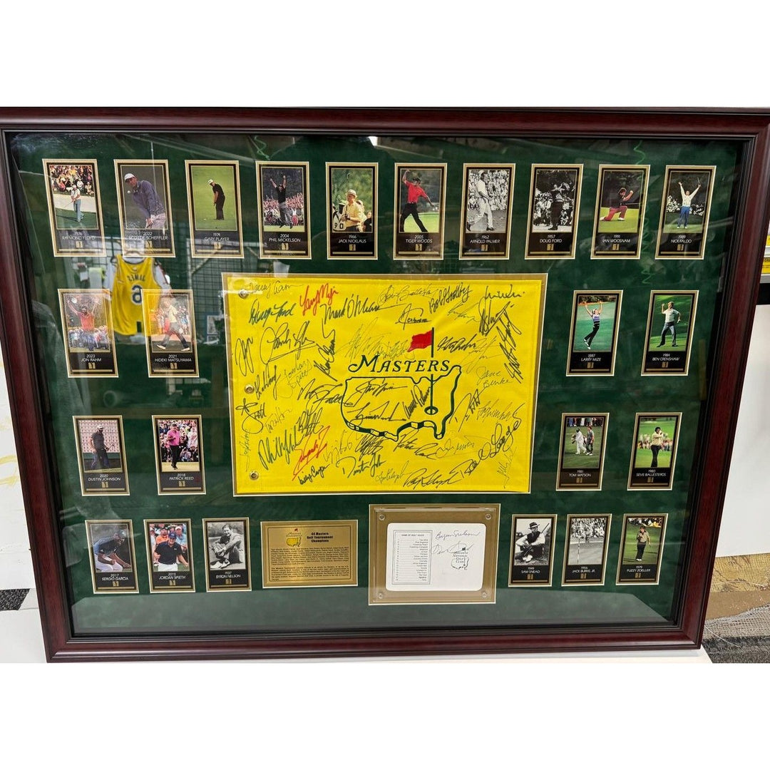 Tiger Woods., Sam Snead , Jack Nicklaus, 44 former Masters Champions pin flag signed with proof & museum quality frame 33x42..