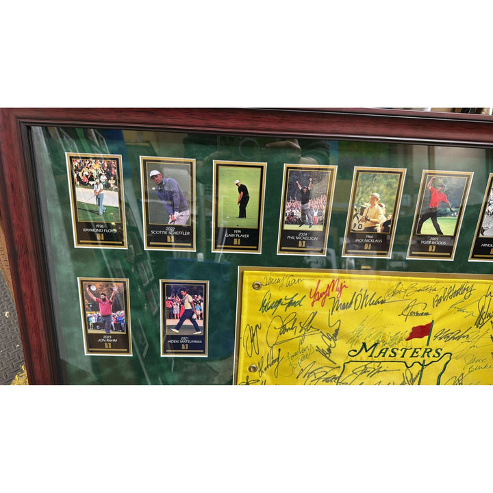 Tiger Woods., Sam Snead , Jack Nicklaus, 44 former Masters Champions pin flag signed with proof & museum quality frame 33x42..