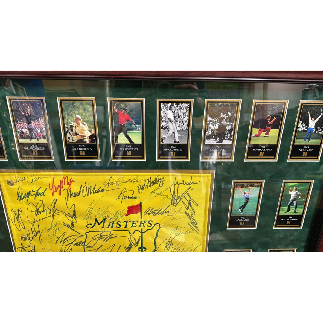 Tiger Woods., Sam Snead , Jack Nicklaus, 44 former Masters Champions pin flag signed with proof & museum quality frame 33x42..