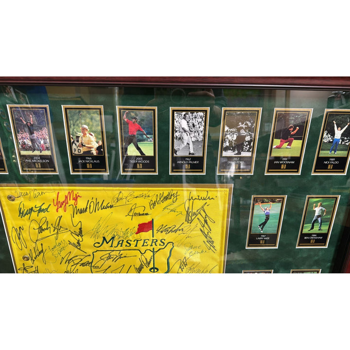 Tiger Woods., Sam Snead , Jack Nicklaus, 44 former Masters Champions pin flag signed with proof & museum quality frame 33x42..