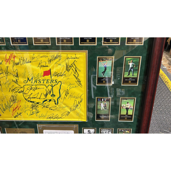 Tiger Woods., Sam Snead , Jack Nicklaus, 44 former Masters Champions pin flag signed with proof & museum quality frame 33x42..