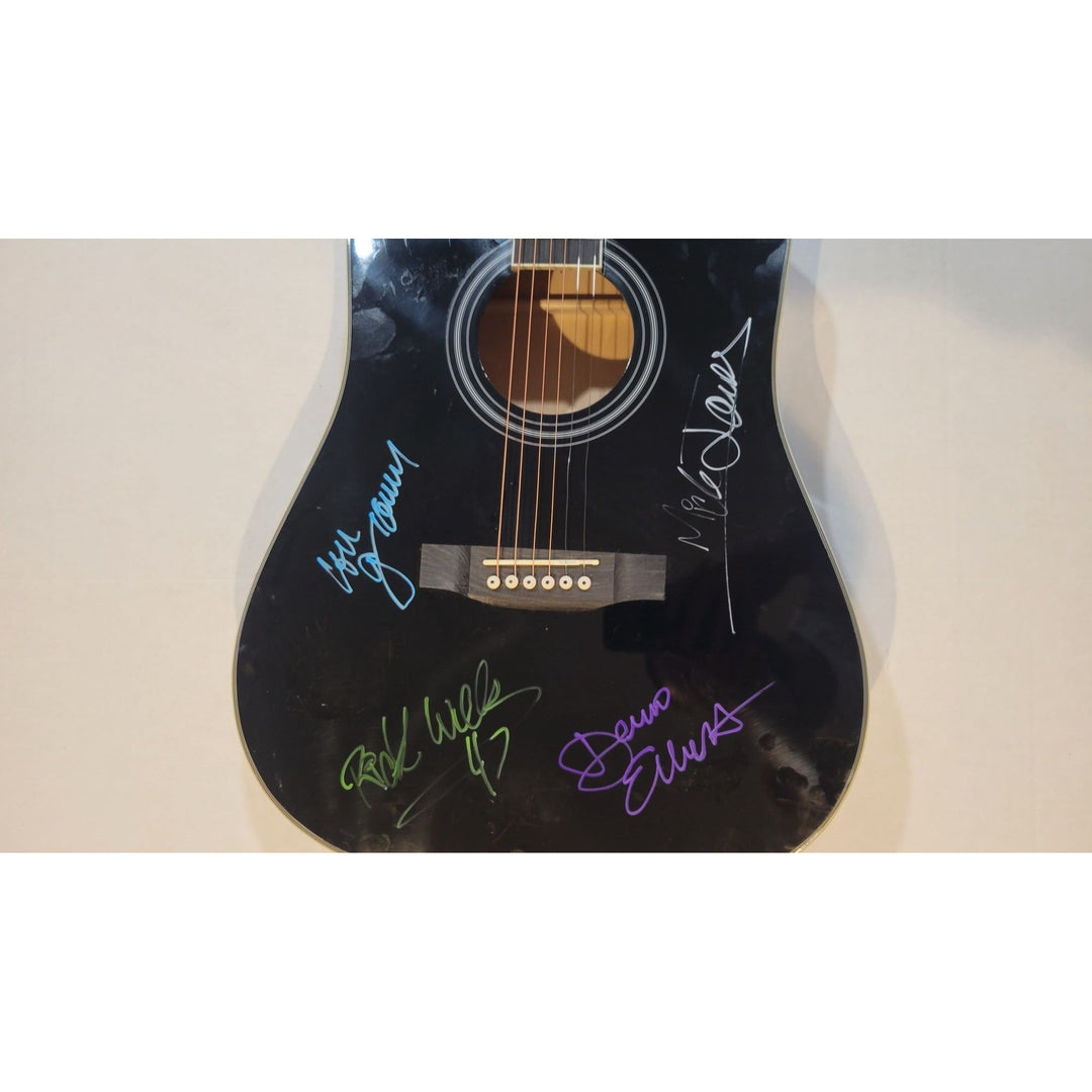 Foreigner Mick Jones, Lou Gramm, Dennis Elliot & Rick Wills full size acoustic guitar signed with proof Awesome Artifacts