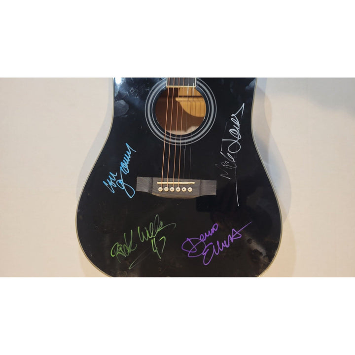 Foreigner Mick Jones, Lou Gramm, Dennis Elliot & Rick Wills full size acoustic guitar signed with proof Awesome Artifacts