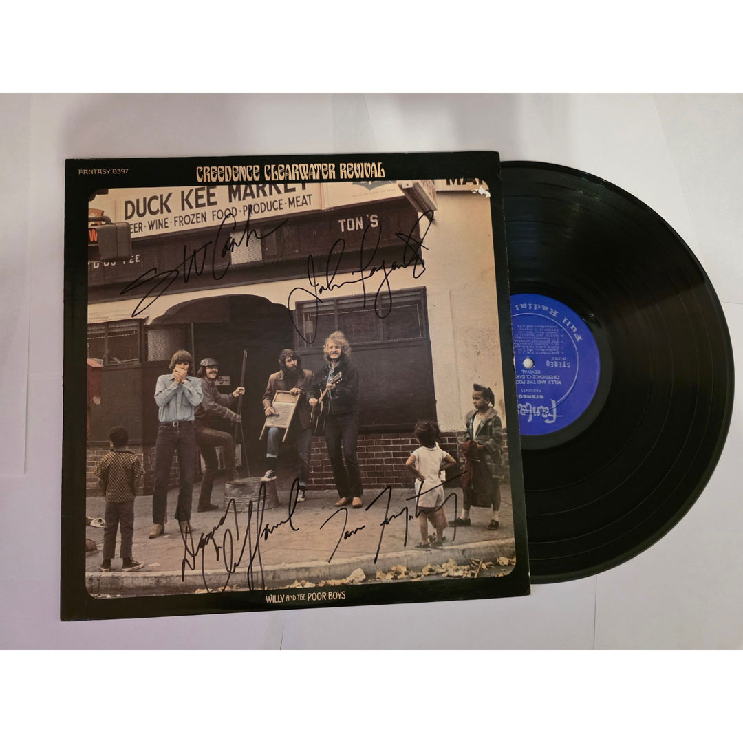 CCR Creedence Clearwater Revival "Willy and The Poor Boys" LP signed with proof.